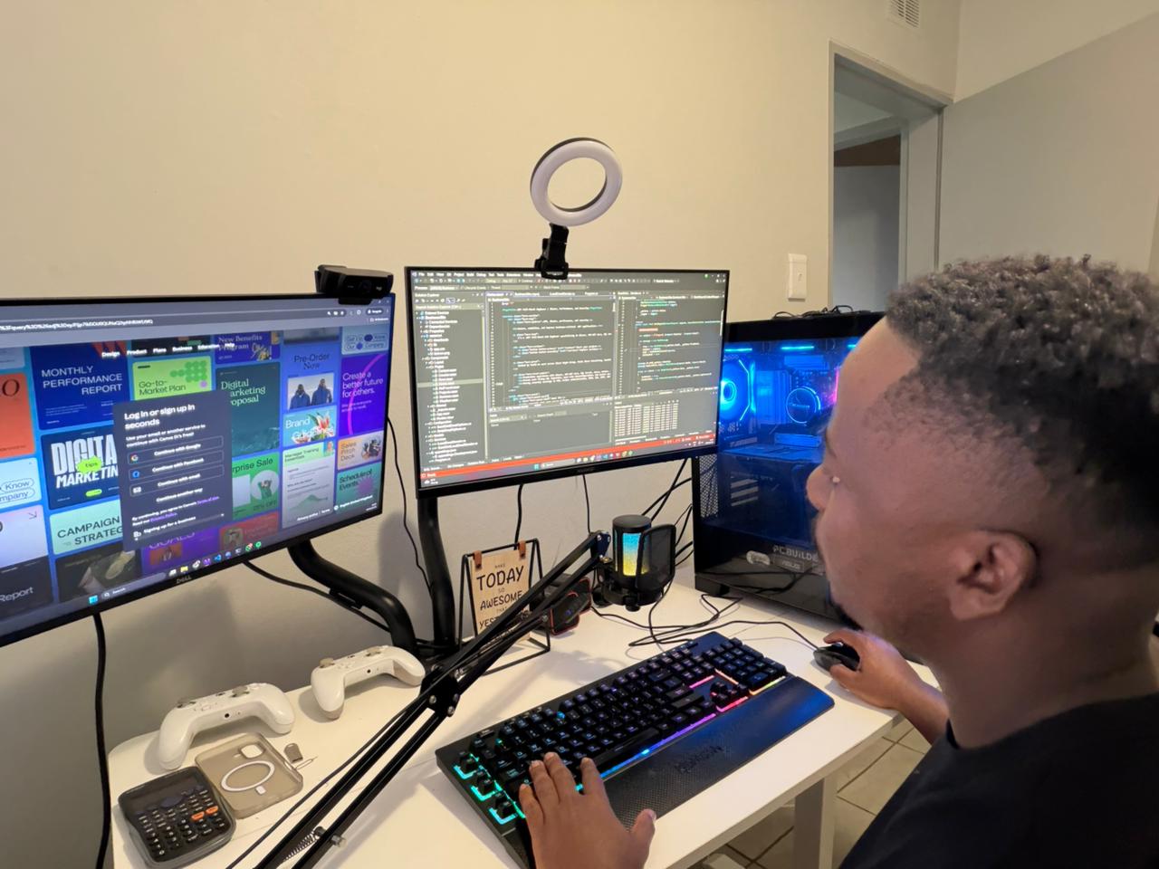Abram Magwai in front of a development setup